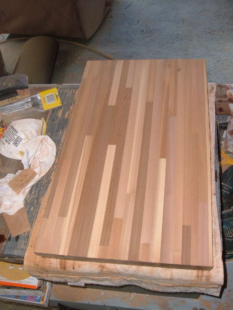 Refinishing The Kitchen Cabinets.