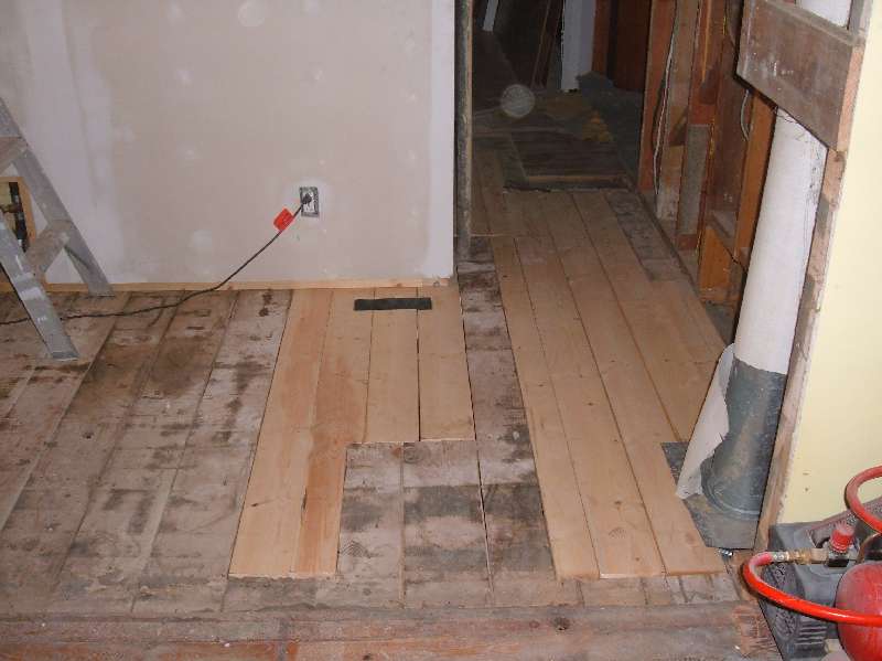 Repairing The Kitchen Floor.