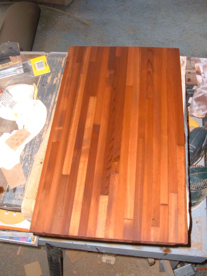 Refinishing The Kitchen Cabinets.