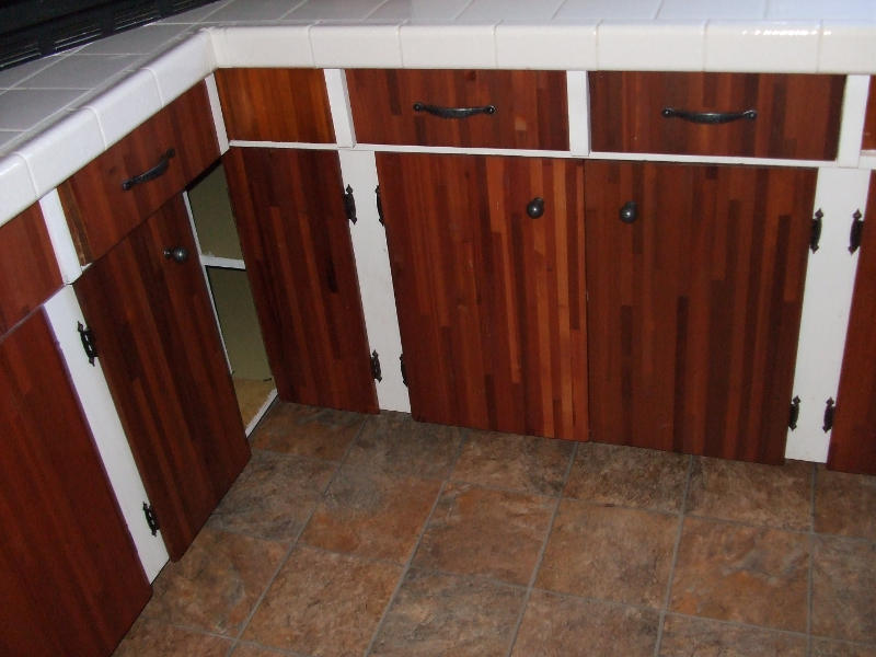 Refinishing The Kitchen Cabinets.