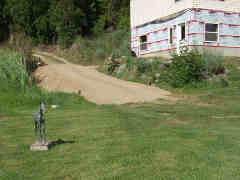 Deck driveway sloped and graded