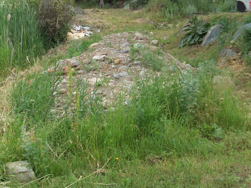 Back Driveway Blocked By Gravel.