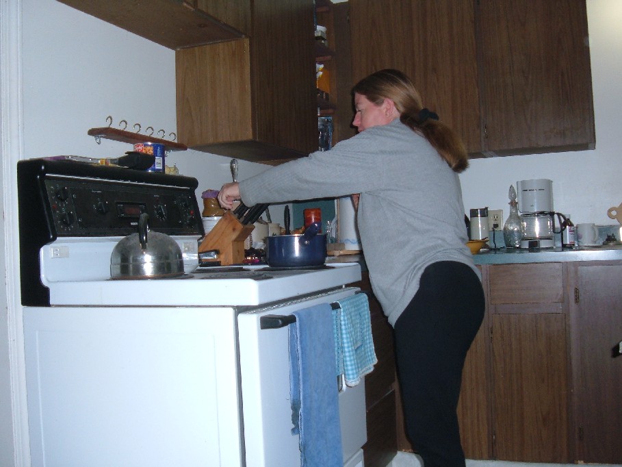 Shauna attempting to cook.
